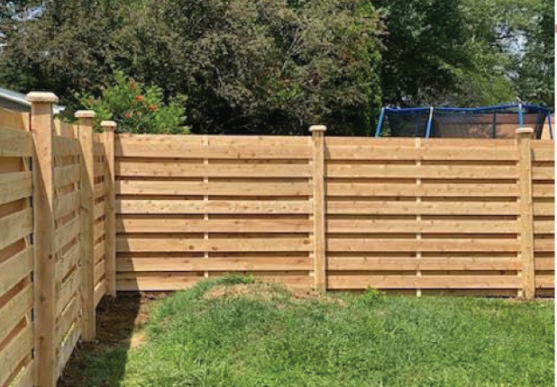 Board-on-board cedar fence by RKC Wood Care Pros, Olathe area