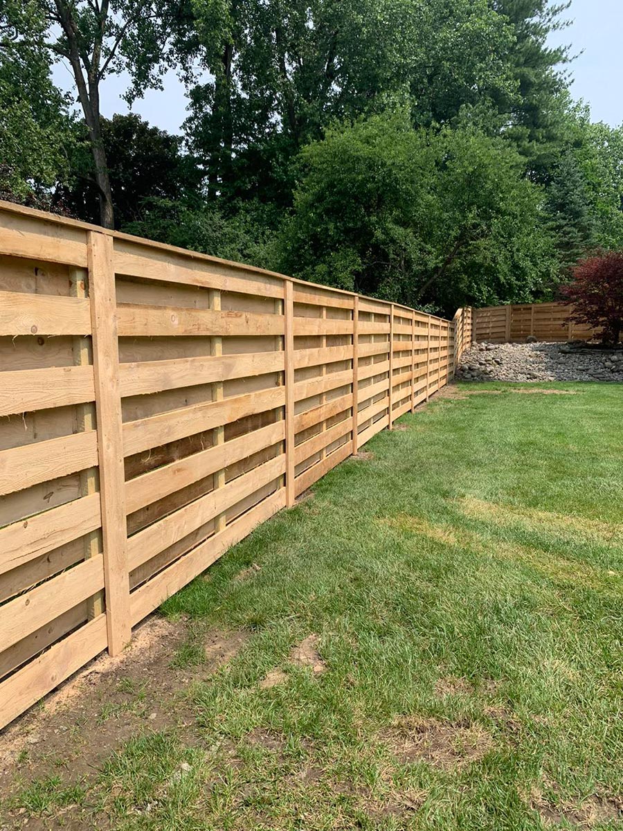 Cedar shadow box fence install by RKC Wood Care Pros in Olathe, KS
