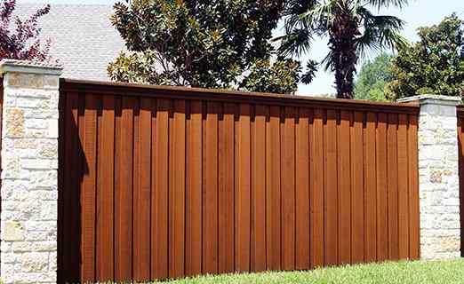 Board-on-board cedar fence in Shawnee by RKC Wood Care Pros