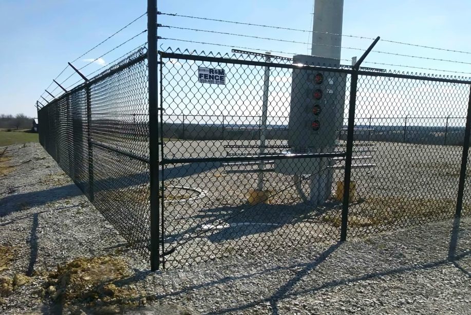 Black vinyl-coated chain link fence — Independence, MO installation FAQ — RKC Wood Care Pros