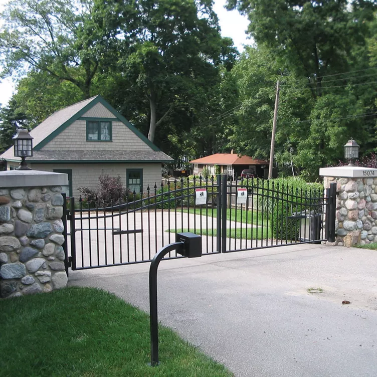 Ornamental iron spear-top double drive gate cost — Grain Valley, MO — RKC Wood Care Pros