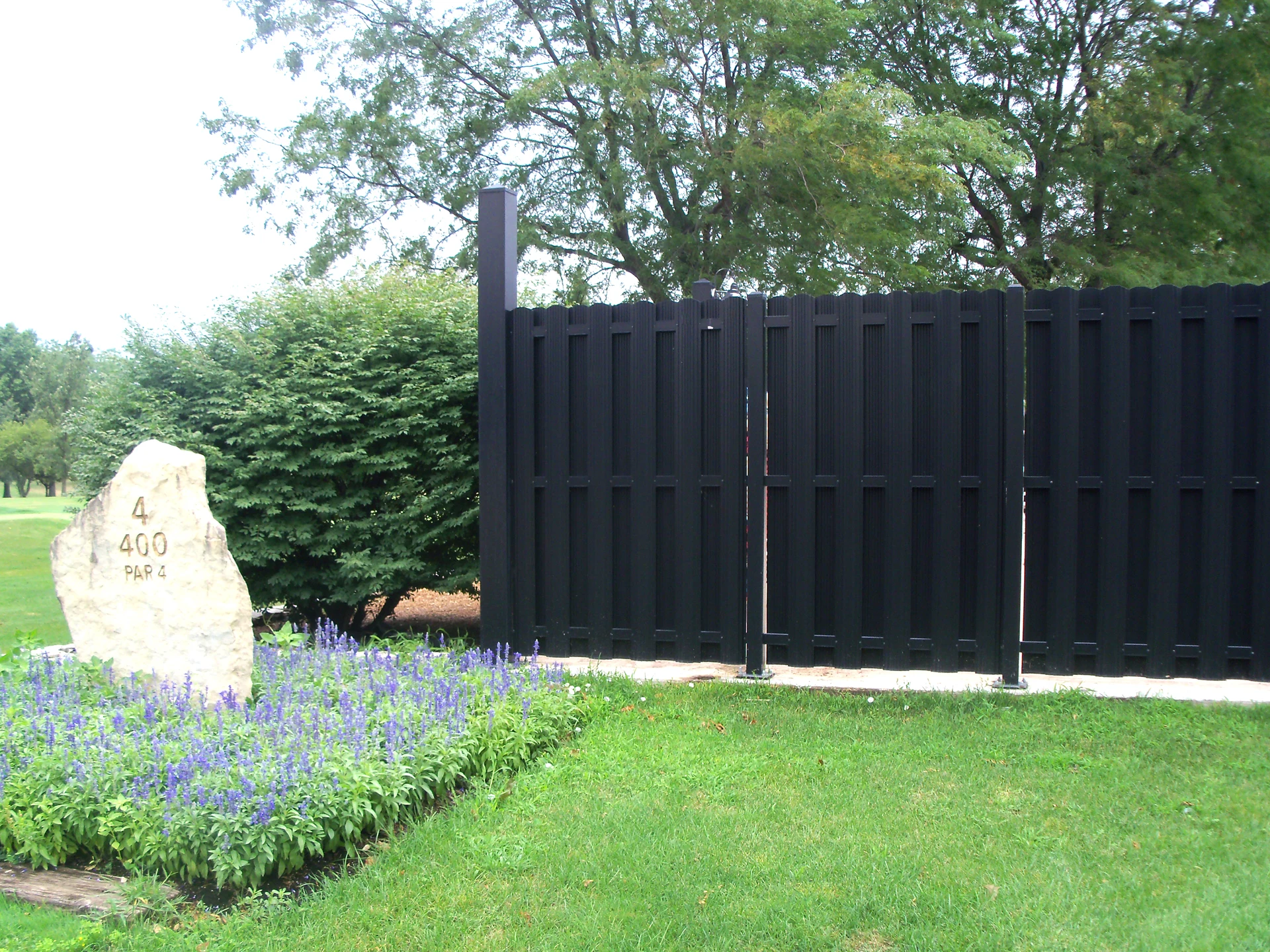 8-foot commercial perimeter security fence with anti-climb mesh in Leawood, KS — RKC Wood Care Pros