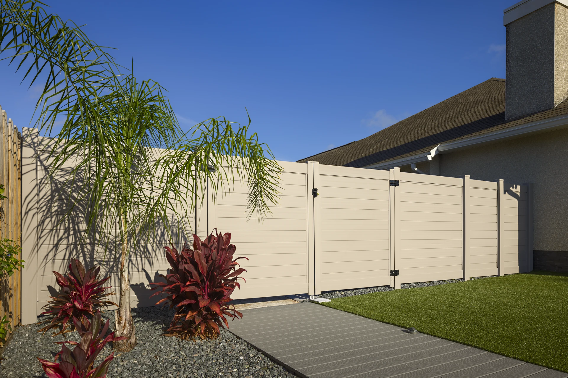 Tongue-and-groove vinyl privacy fence panel in Liberty, MO — RKC Wood Care Pros