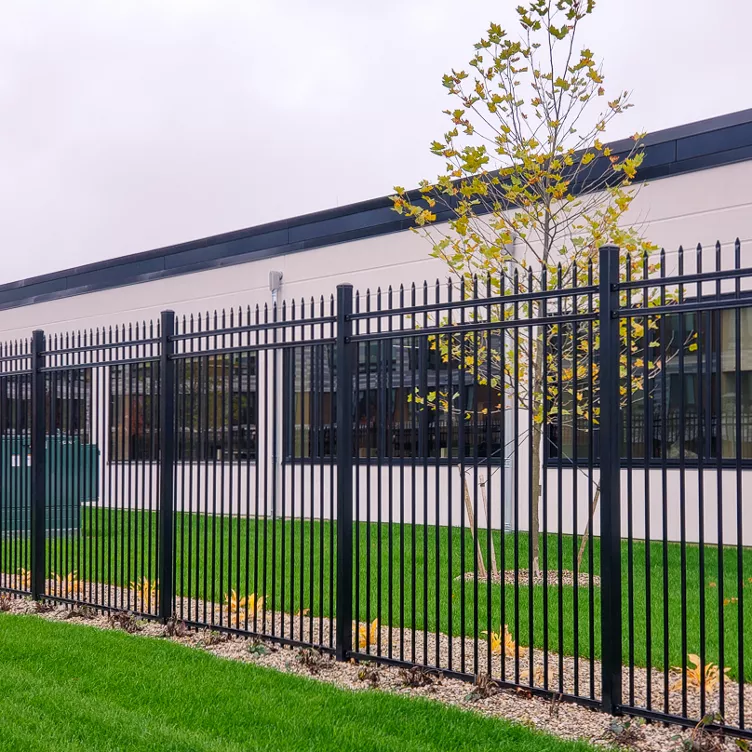 Dumpster screening enclosure with property line demarcation in Belton, MO — RKC Wood Care Pros