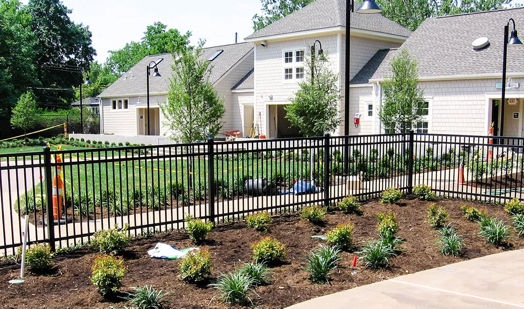 Powder-coated pool fence still rust-free after years of chlorine and KC sun