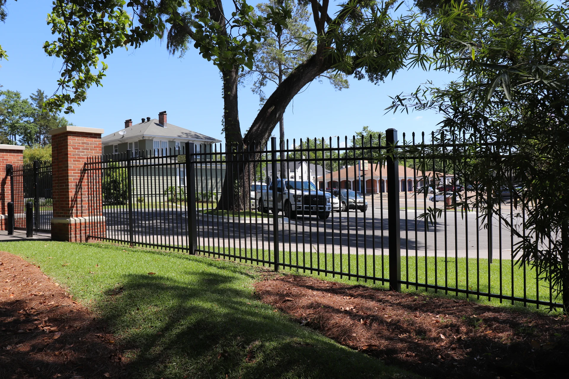 Finished powder-coated aluminum fence install by RKC Wood Care Pros in the Kansas City metro