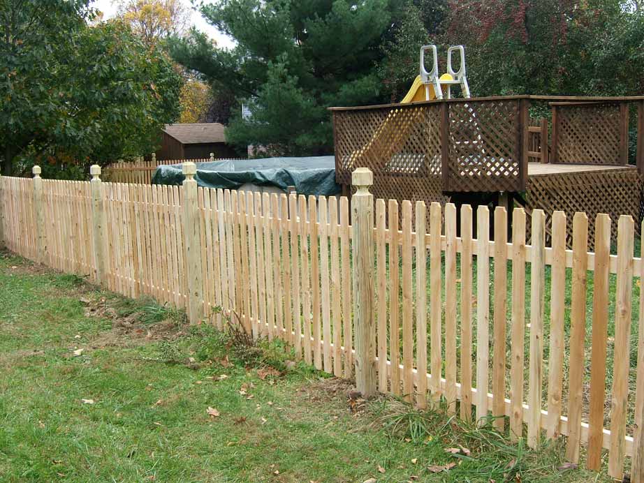 Shadow box cedar fence with air-gap design in Pleasant Hill, MO — RKC Wood Care Pros