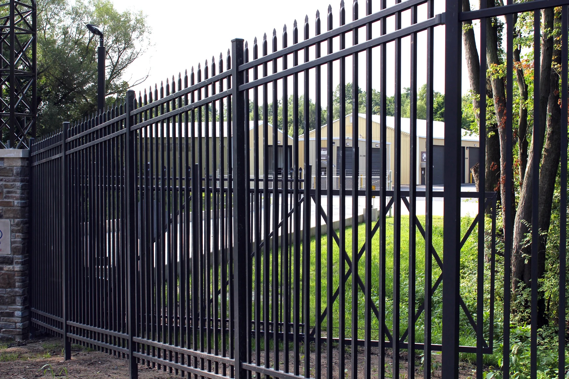 Ornamental iron front-yard fence in Prairie Village by RKC Wood Care Pros