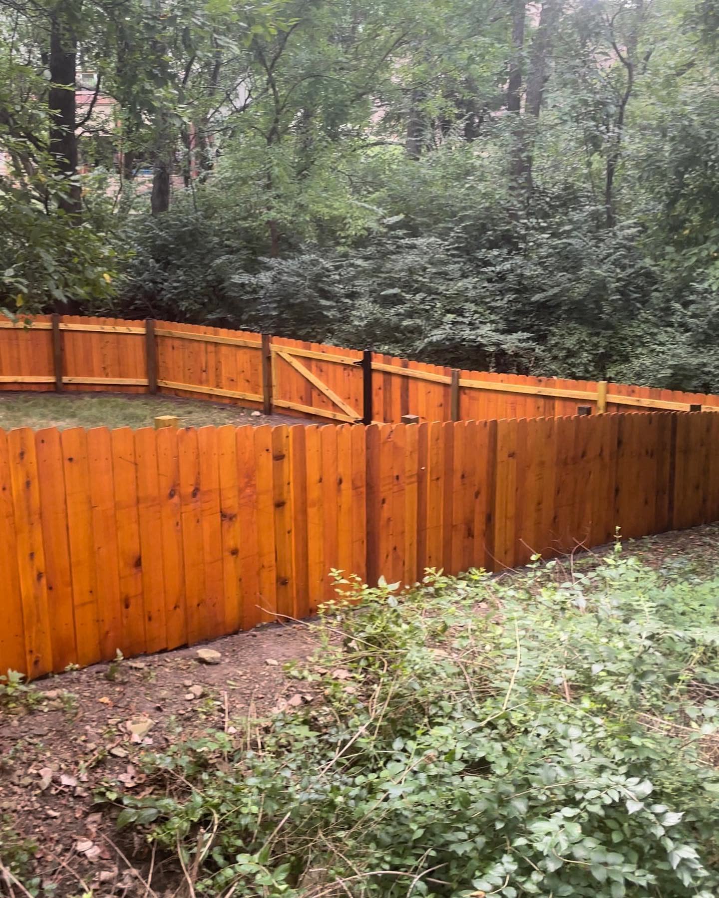 Finished Western Red Cedar privacy fence install by RKC Wood Care Pros in the Kansas City metro