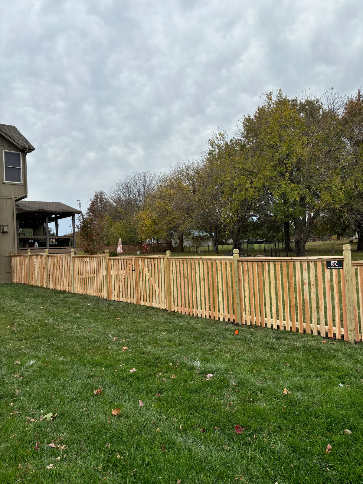 Detail of cedar privacy fence board spacing and post in Stilwell, KS